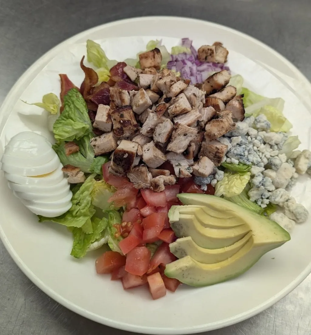 Traditional chopped Cobb salad with blue cheese dressing, perfect for lunch in Branford.