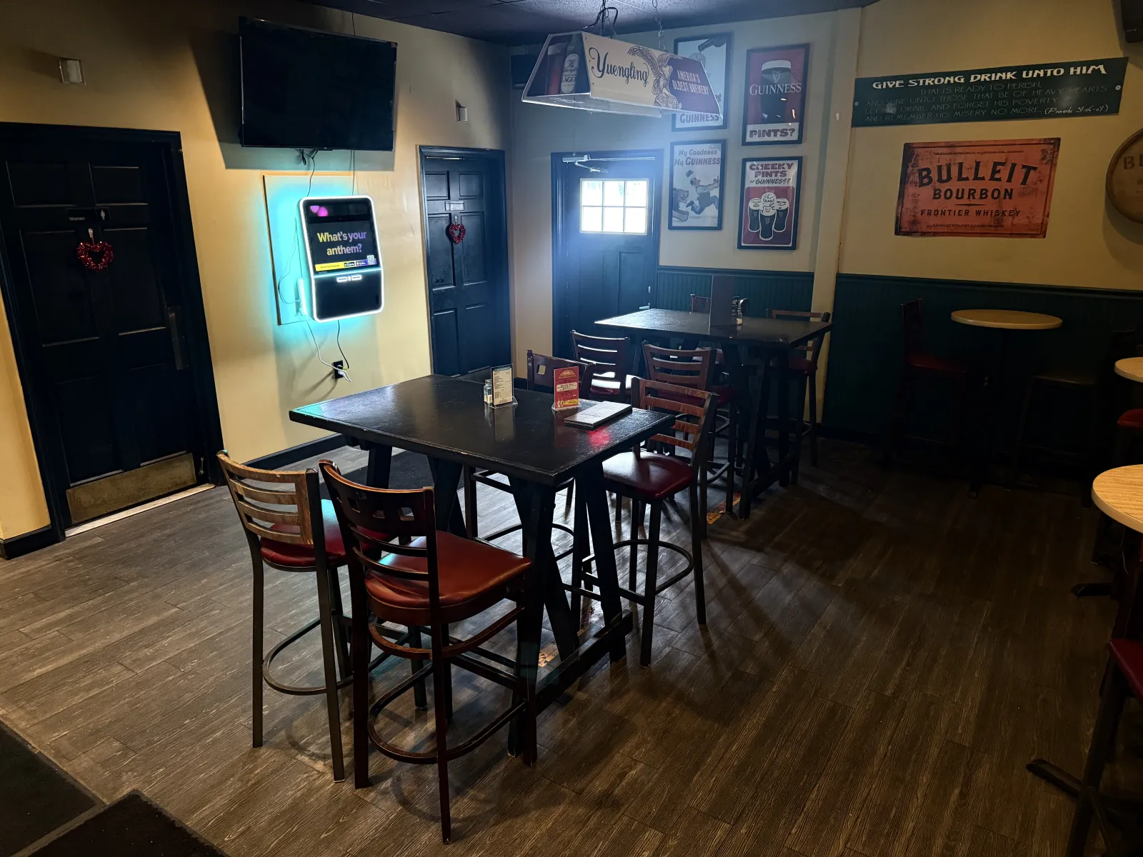 Pub room with high-top tables at Longley's.