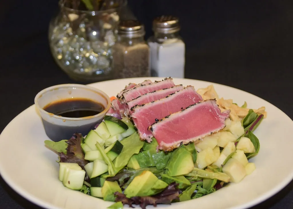 Seared Ahi tuna salad topped with crunchy wonton strips.