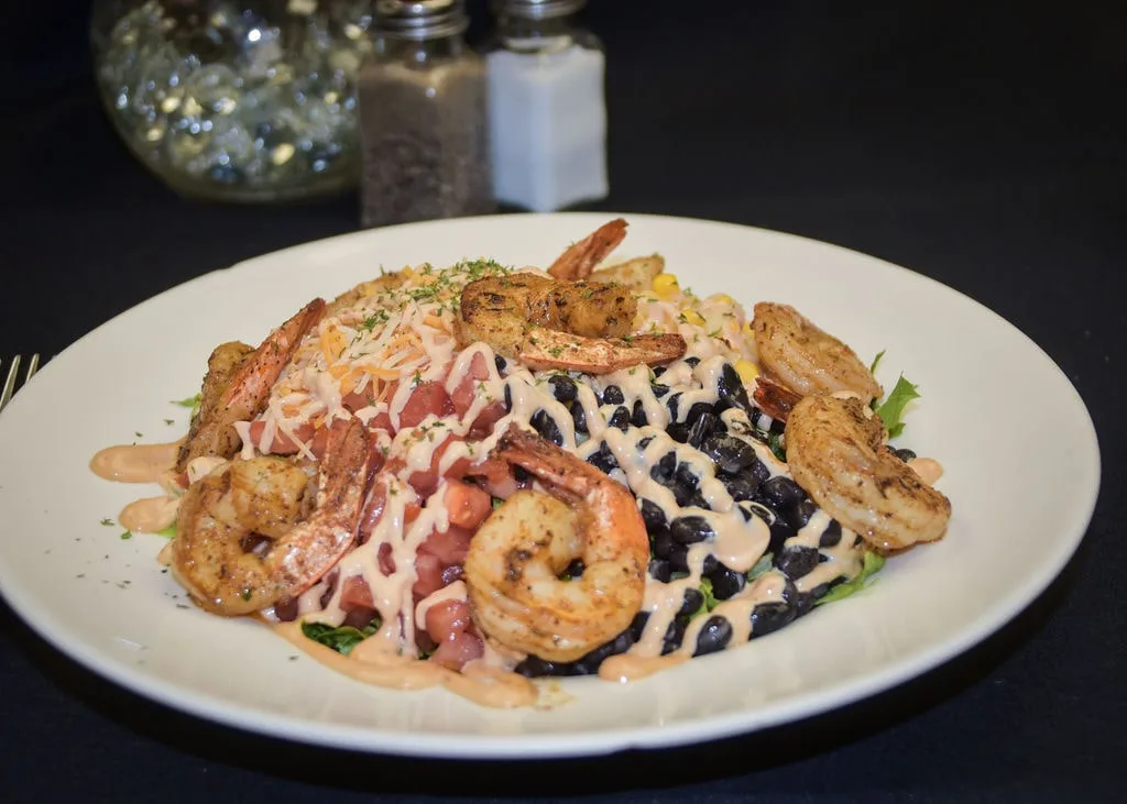 Southwest shrimp salad featuring black beans and corn.